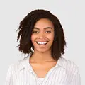 Happy business woman in white top on a white background