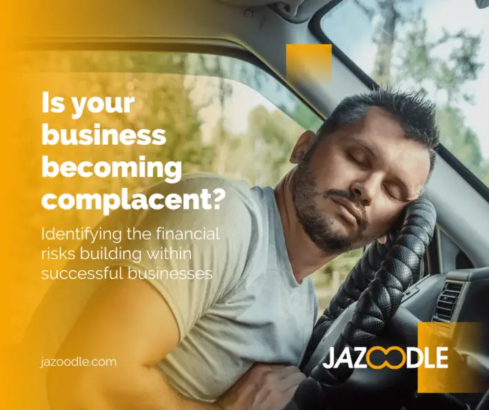 Graphic of man falling asleep at wheel of car - analogy to complacency in business