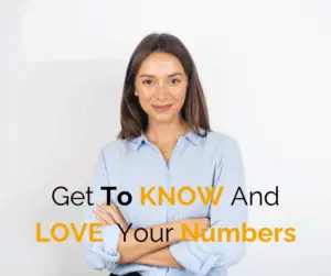 know your numbers blog. Picture of a professional business woman with grey background and blue blouse