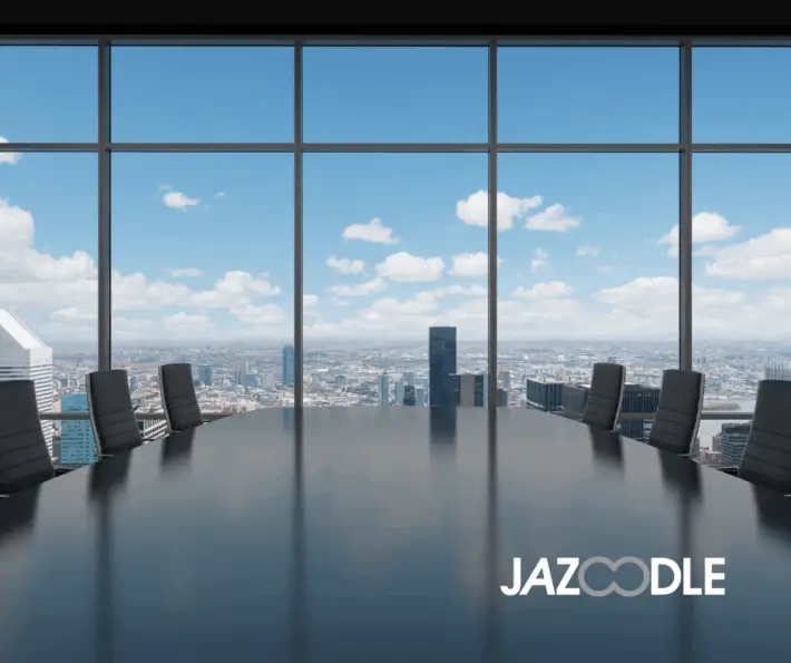 Picture of an office boardroom with blue sky looking out of the windows